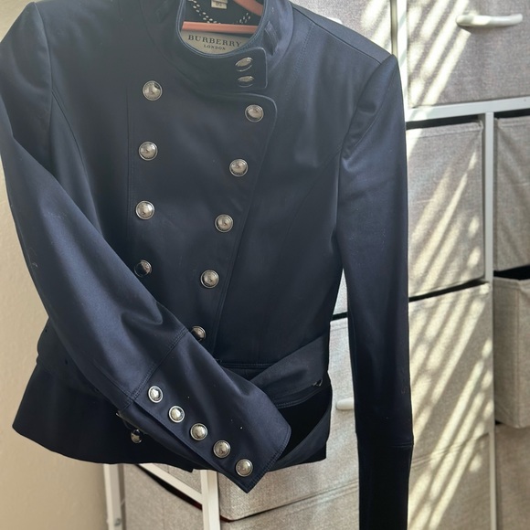 Burberry London Biker Jacket
BlackStand Collar, Flap Pockets & Snap Closure - Picture 5 of 6